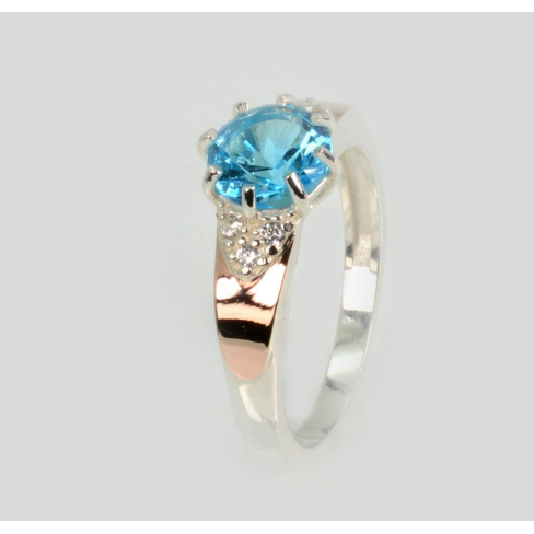 Серебряное кольцо с золотыми вставками