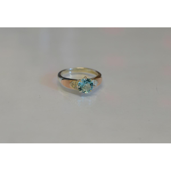 Серебряное кольцо с золотыми вставками (124к)