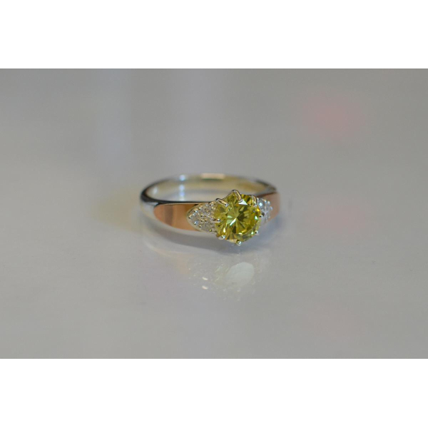 Серебряное кольцо с золотыми вставками (124к)