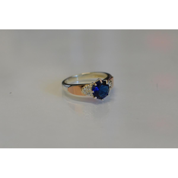 Серебряное кольцо с золотыми вставками (124к)