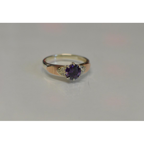 Серебряное кольцо с золотыми вставками (124к)