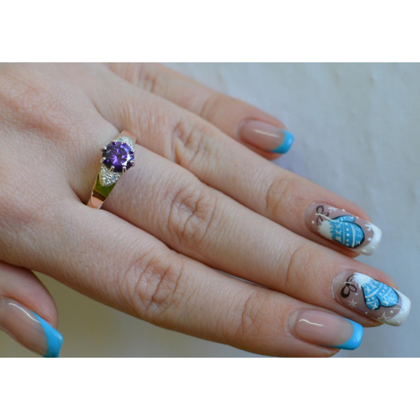 Серебряное кольцо с золотыми вставками (124к)