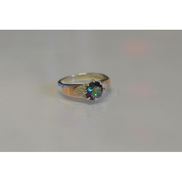 Серебряное кольцо с золотыми вставками (124к)