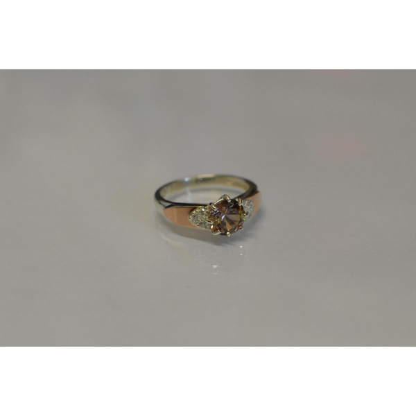 Серебряное кольцо с золотыми вставками (124к)