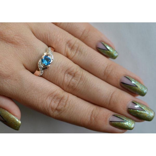 Серебряное кольцо с золотыми вставками (128к)