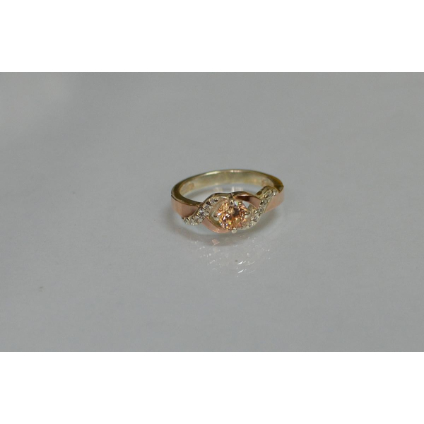 Серебряное кольцо с золотыми вставками (128к)