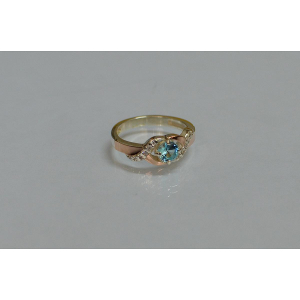 Серебряное кольцо с золотыми вставками (128к)