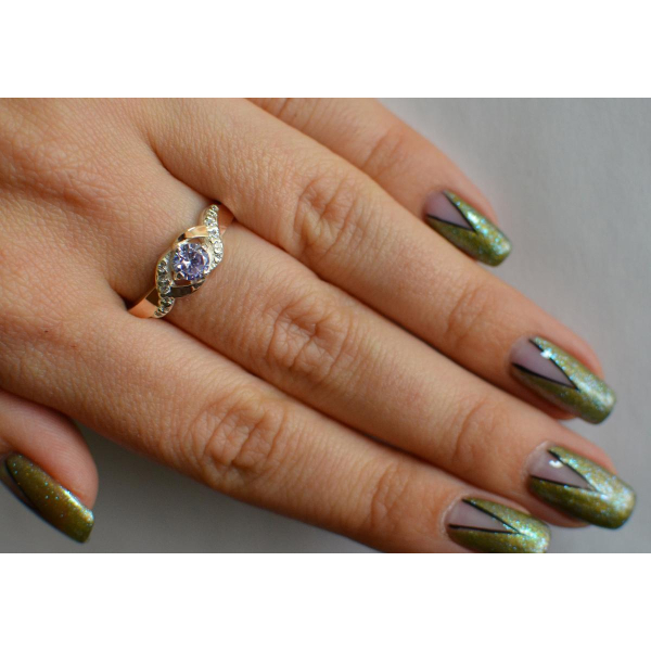 Серебряное кольцо с золотыми вставками (128к)