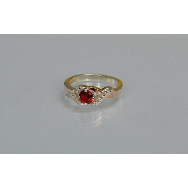 Серебряное кольцо с золотыми вставками (128к)