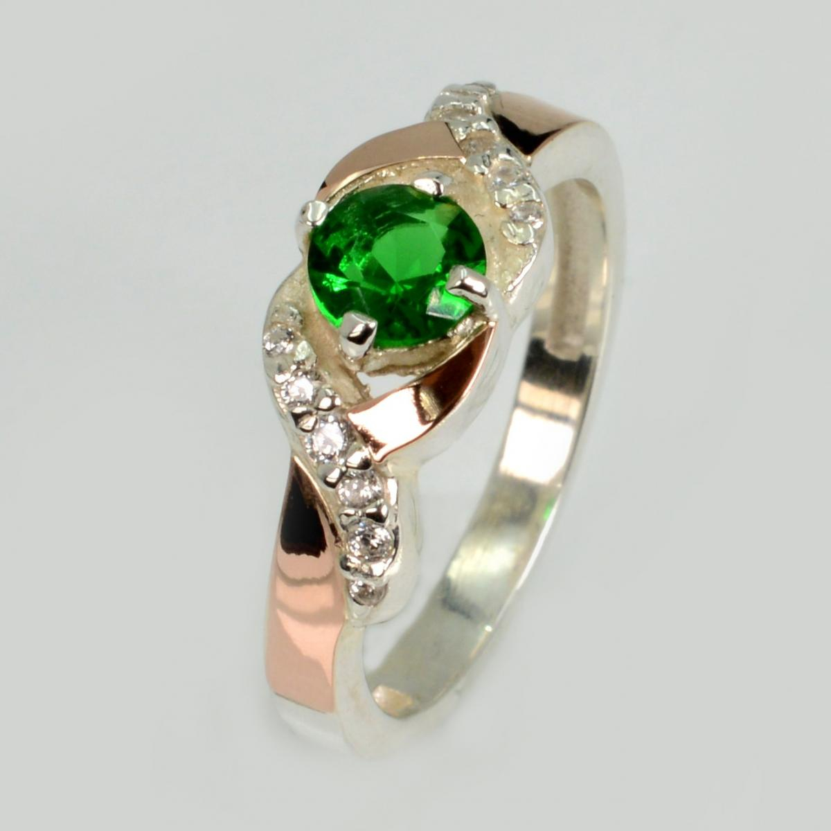 Серебряное кольцо с золотыми вставками (128к)