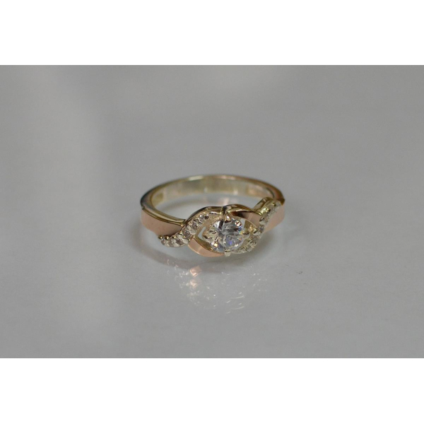 Серебряное кольцо с золотыми вставками (128к)