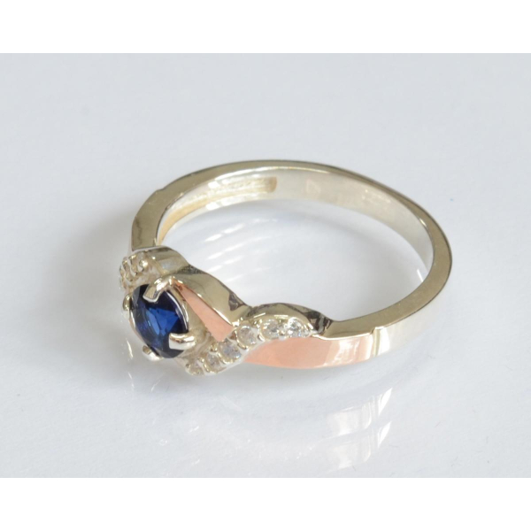 Серебряное кольцо с золотыми вставками (128к)