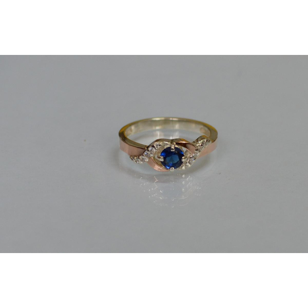 Серебряное кольцо с золотыми вставками (128к)