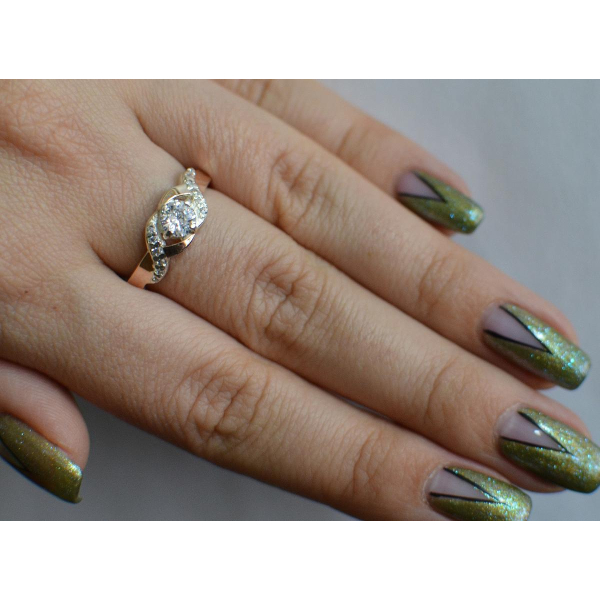 Серебряное кольцо с золотыми вставками (128к)