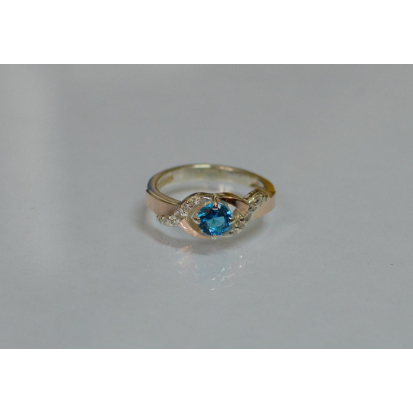 Серебряное кольцо с золотыми вставками (128к)