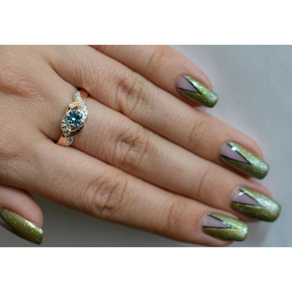 Серебряное кольцо с золотыми вставками (128к)