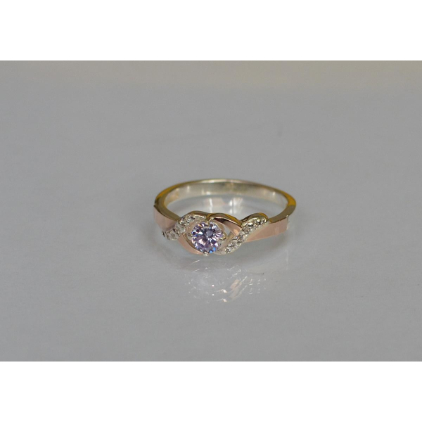 Серебряное кольцо с золотыми вставками (128к)