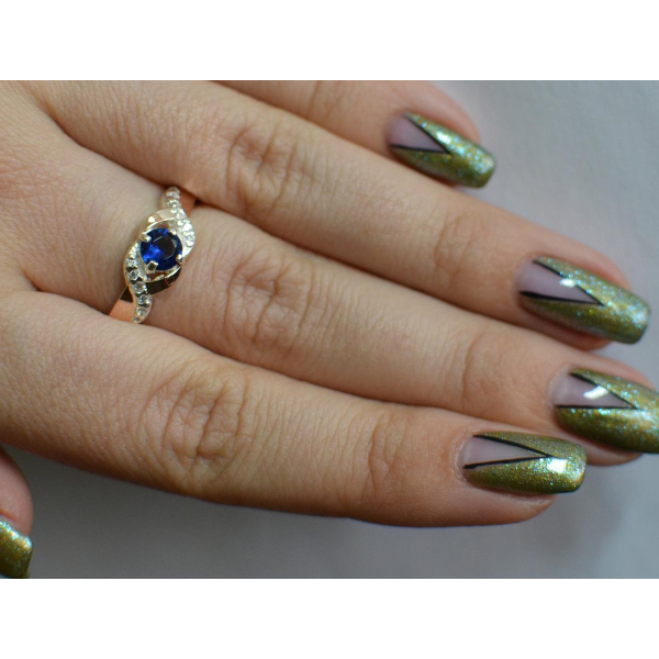 Серебряное кольцо с золотыми вставками (128к)