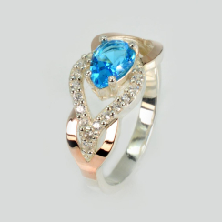 Срібна каблучка з золотими вставками