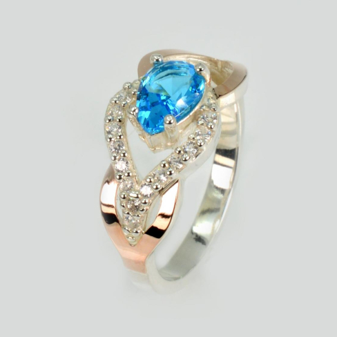 Серебряное кольцо с золотыми вставками