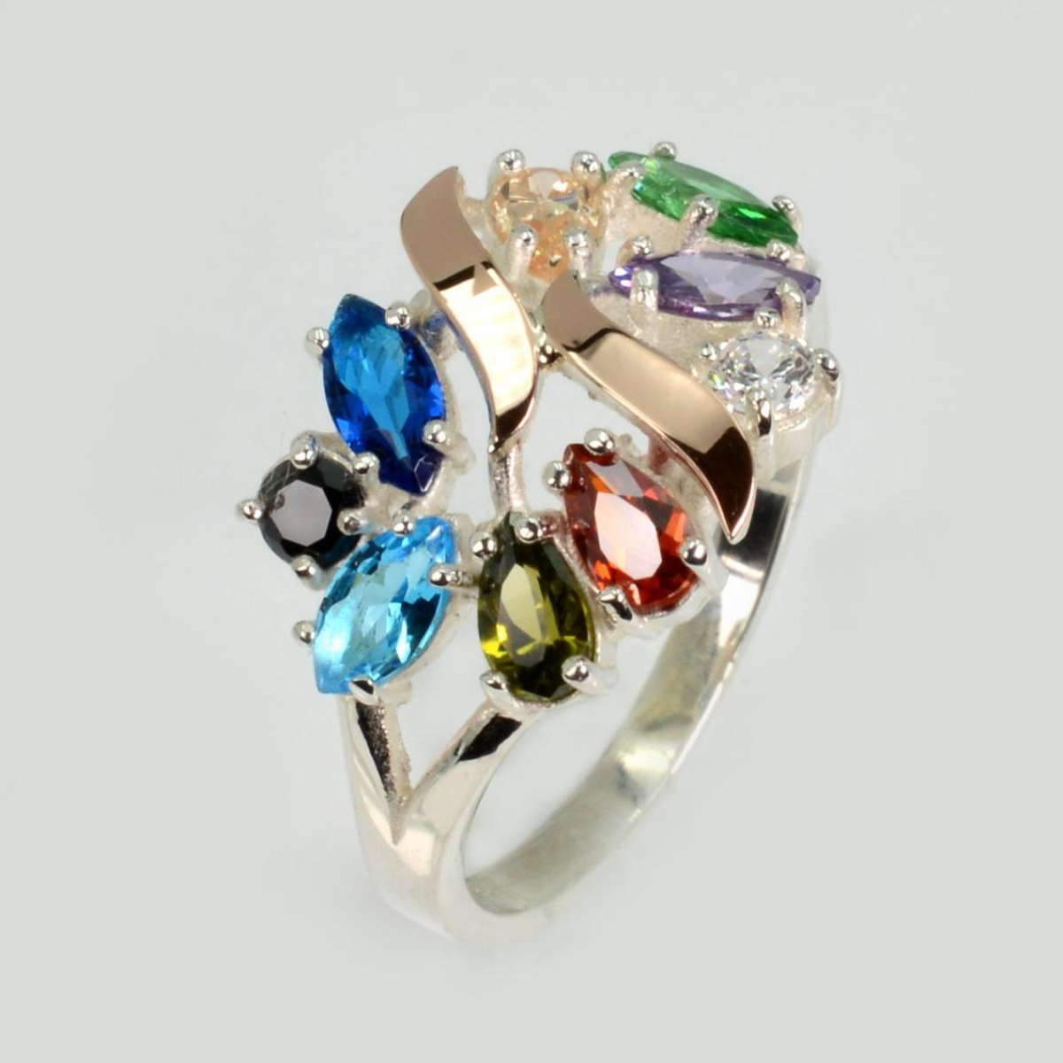 Серебряное кольцо с золотыми вставками (133к)