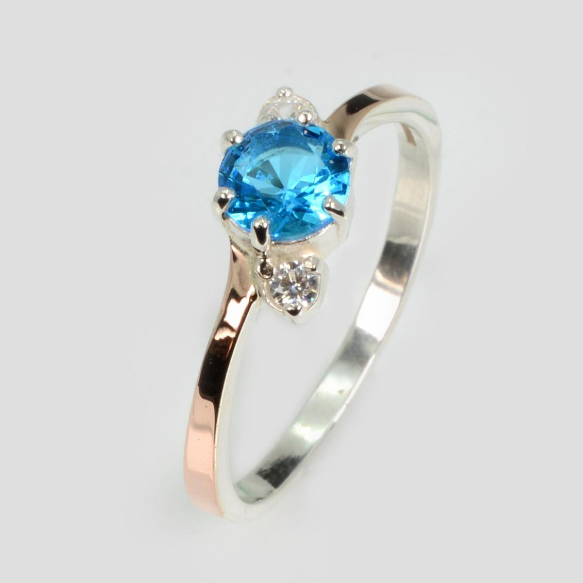 Серебряное кольцо с золотыми вставками (134к)