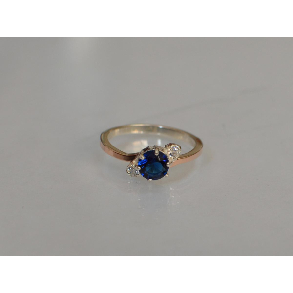 Серебряное кольцо с золотыми вставками (134к)