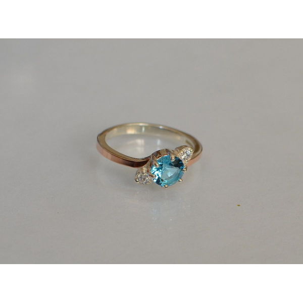 Серебряное кольцо с золотыми вставками (134к)