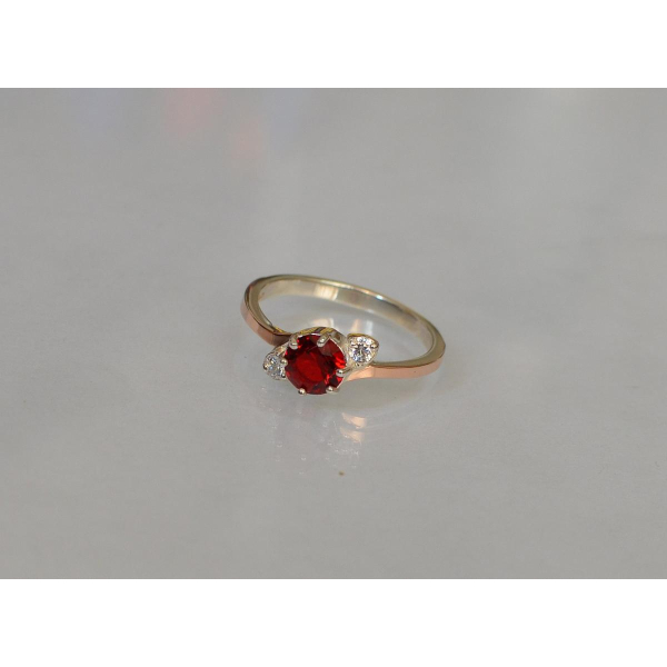 Серебряное кольцо с золотыми вставками (134к)