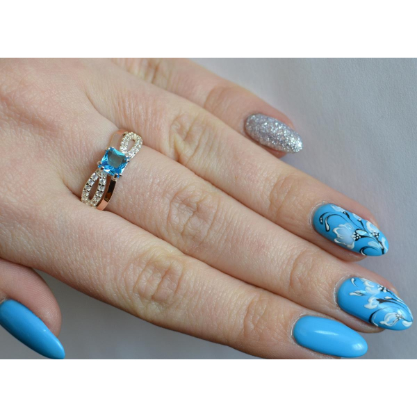 Серебряное кольцо с золотыми вставками (136к)