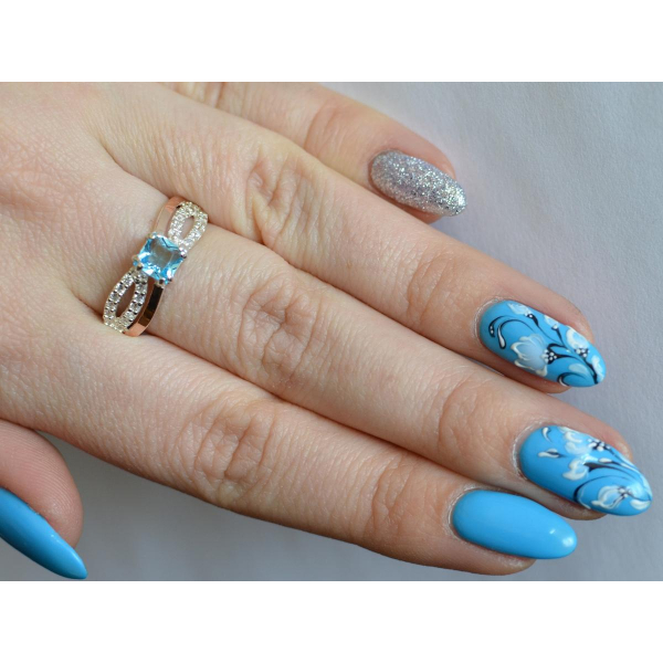 Серебряное кольцо с золотыми вставками (136к)