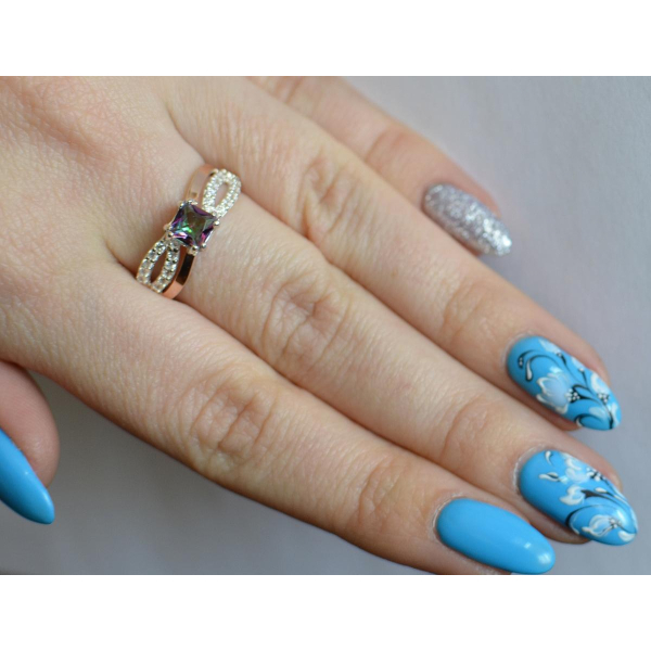 Серебряное кольцо с золотыми вставками (136к)