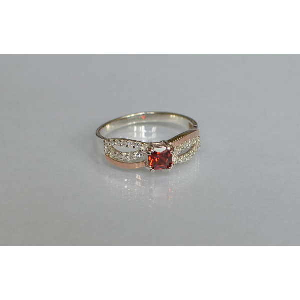 Серебряное кольцо с золотыми вставками (136к)