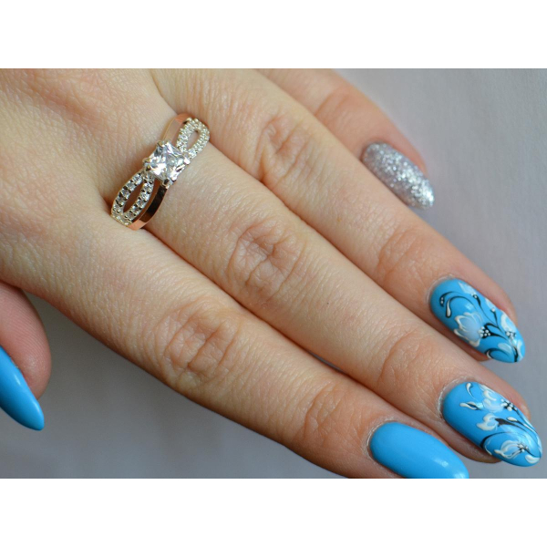 Серебряное кольцо с золотыми вставками (136к)