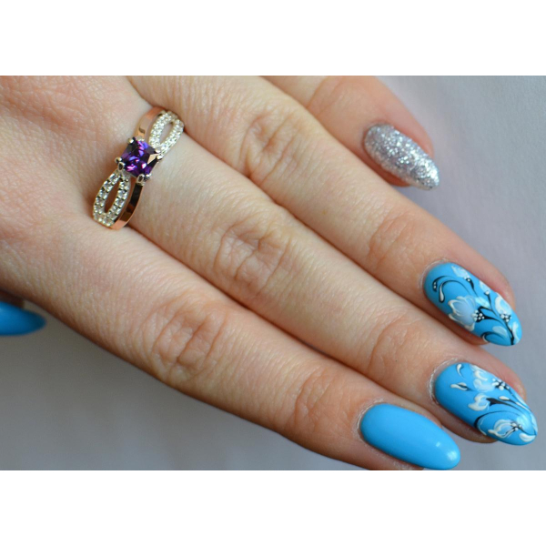 Серебряное кольцо с золотыми вставками (136к)