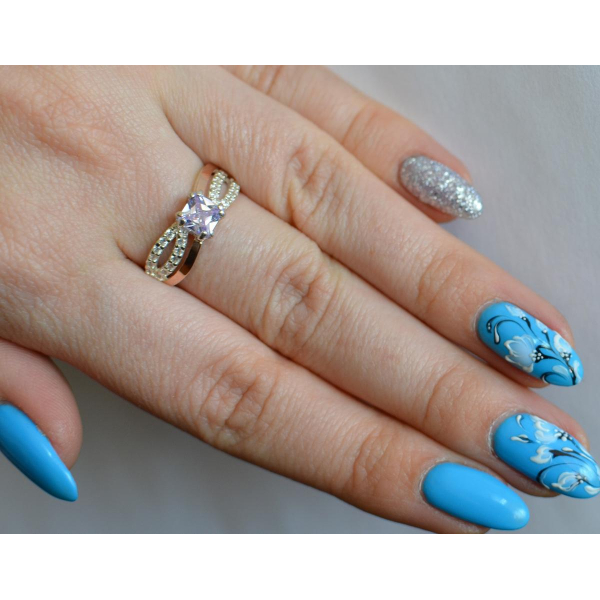 Серебряное кольцо с золотыми вставками (136к)