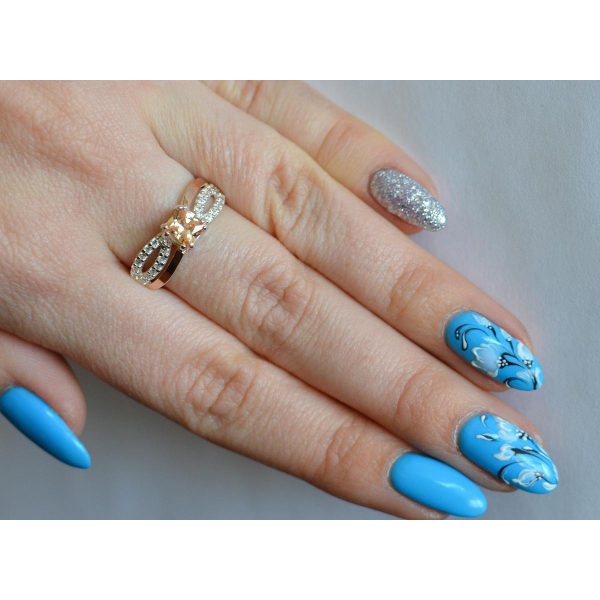 Серебряное кольцо с золотыми вставками (136к)