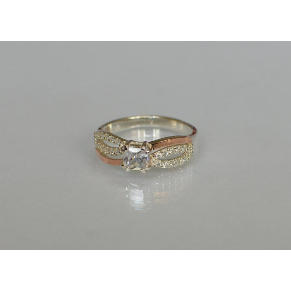 Серебряное кольцо с золотыми вставками (136к)