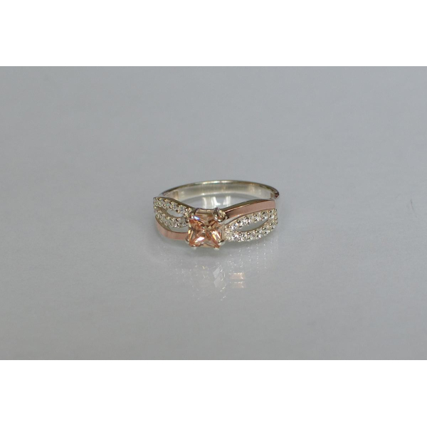 Серебряное кольцо с золотыми вставками (136к)