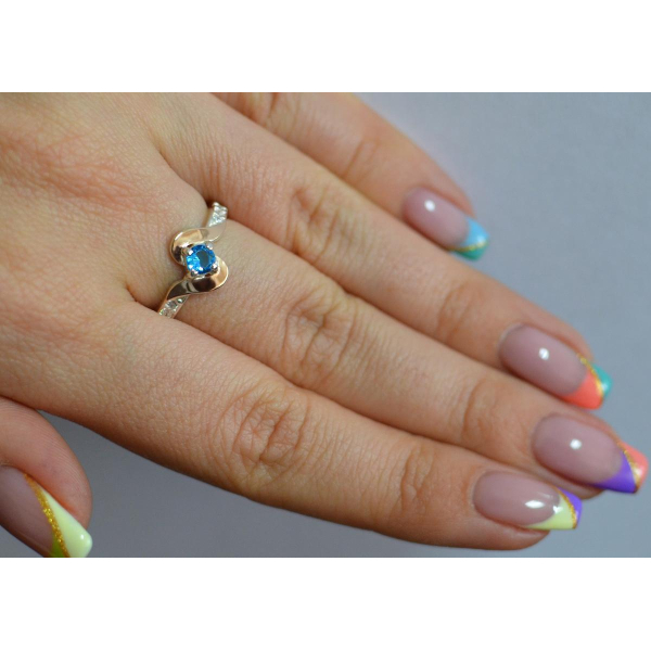 Серебряное кольцо с золотыми вставками (142к)