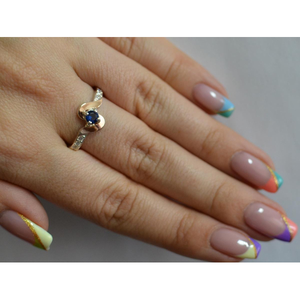 Серебряное кольцо с золотыми вставками (142к)