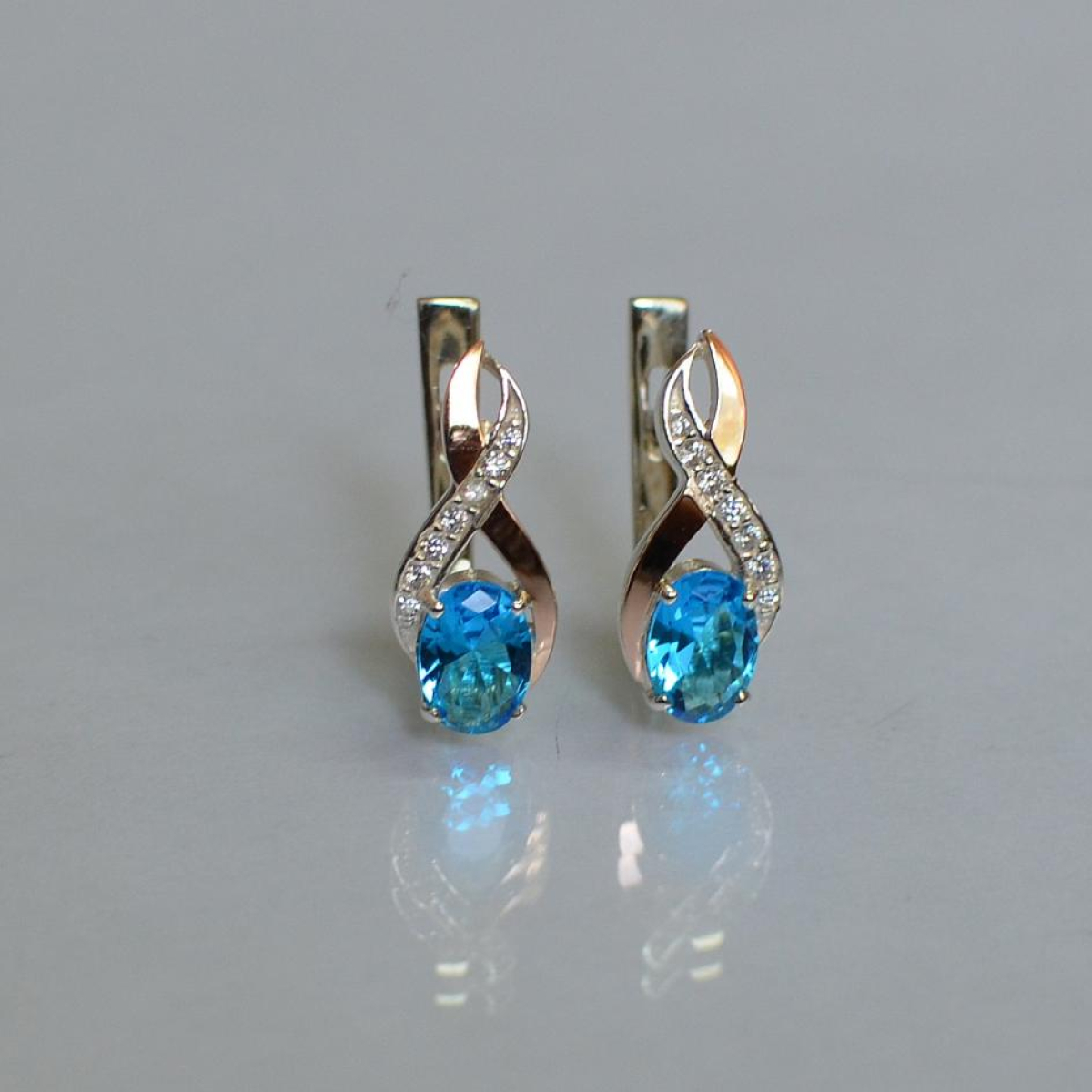 Серебряные серьги с золотыми вставками (143с)