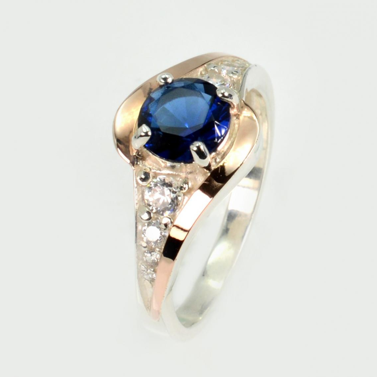 Серебряное кольцо с золотыми вставками (145к)