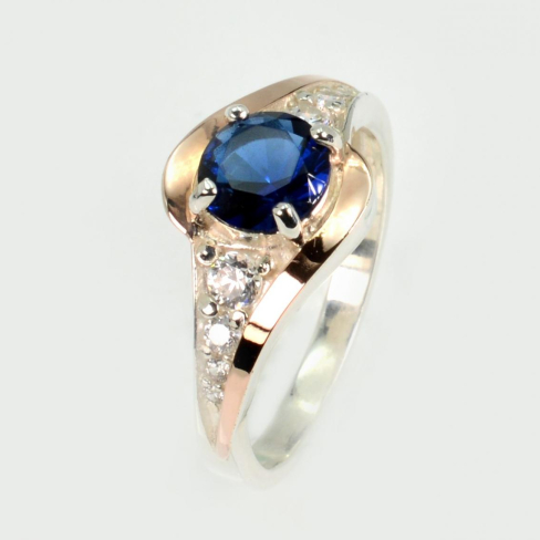 Серебряное кольцо с золотыми вставками