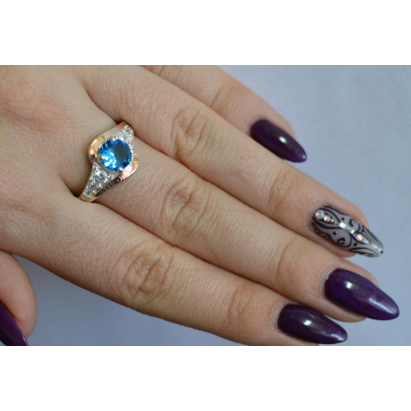 Серебряное кольцо с золотыми вставками (145к)