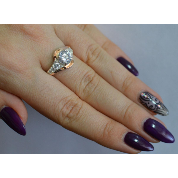 Серебряное кольцо с золотыми вставками (145к)