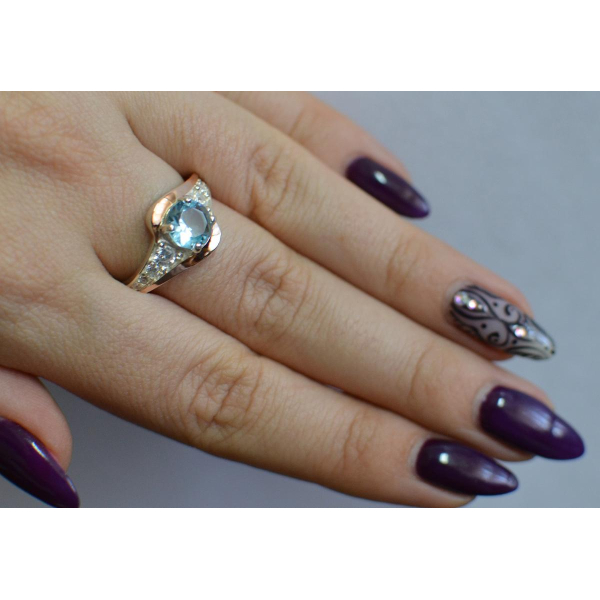 Серебряное кольцо с золотыми вставками (145к)