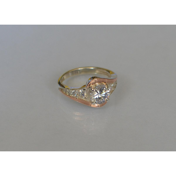 Серебряное кольцо с золотыми вставками (145к)