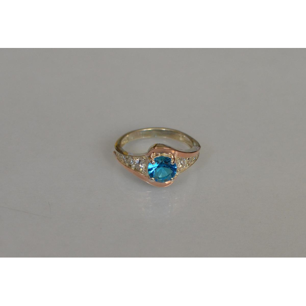 Серебряное кольцо с золотыми вставками (145к)