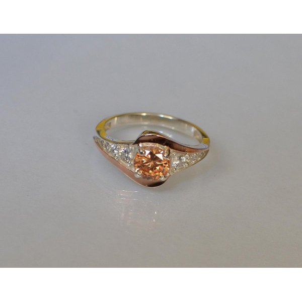 Серебряное кольцо с золотыми вставками (145к)